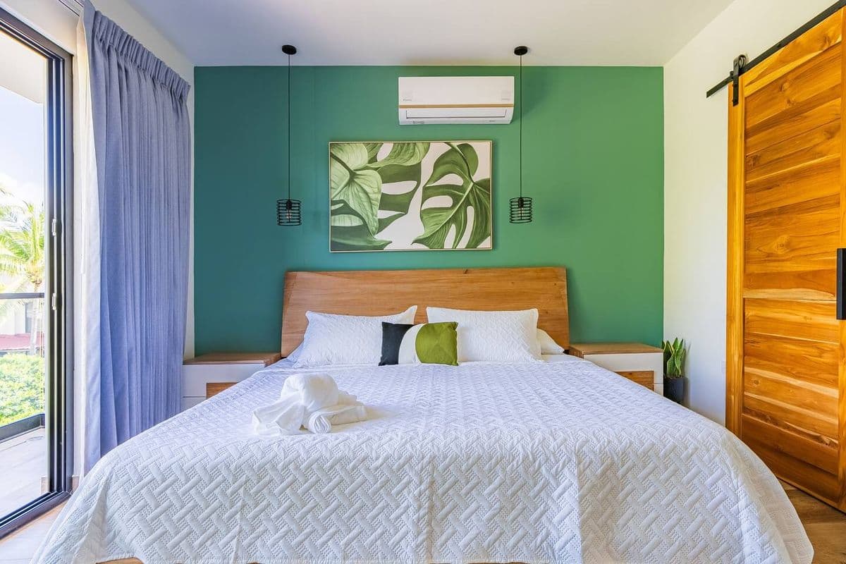 Villa bedroom with botanical art