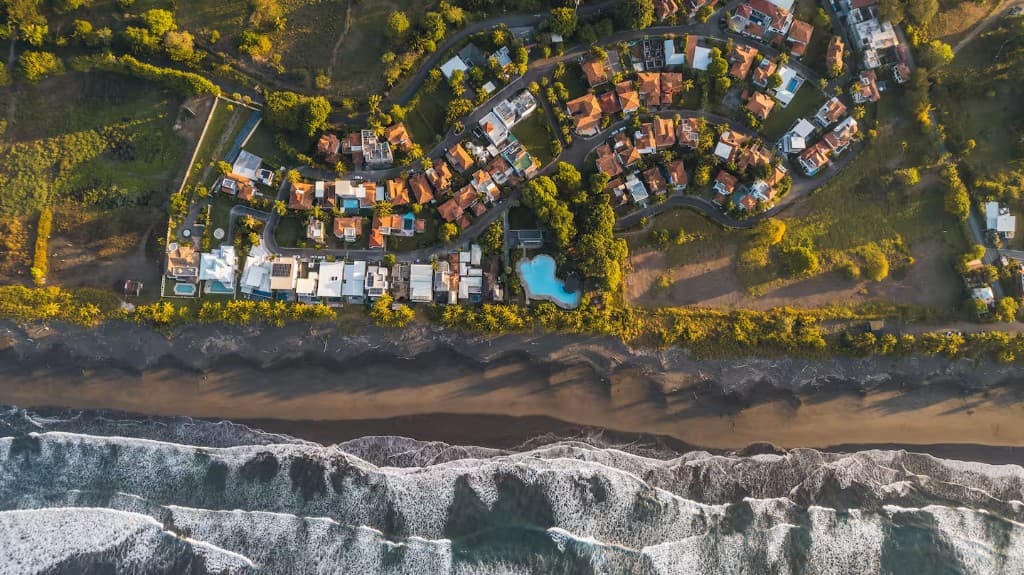 Aerial view of Playa Hermosa villa community and coastline